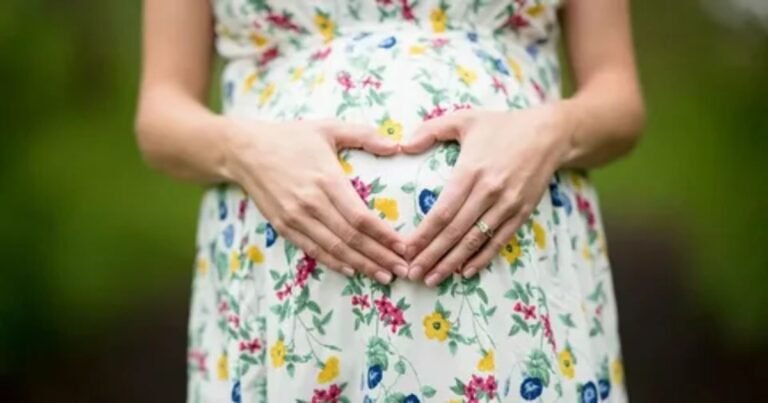 A couple poses creatively for a maternity photoshoot, showcasing unique and artistic ideas for capturing their pregnancy journey.