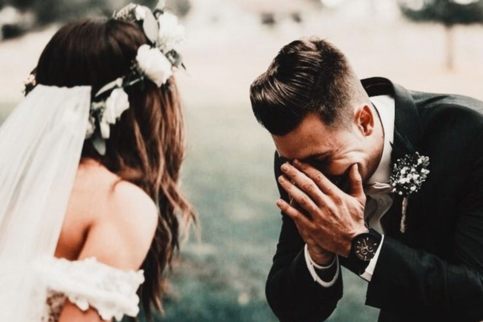 Emotional first look between bride and groom at a wedding party, filled with joy.