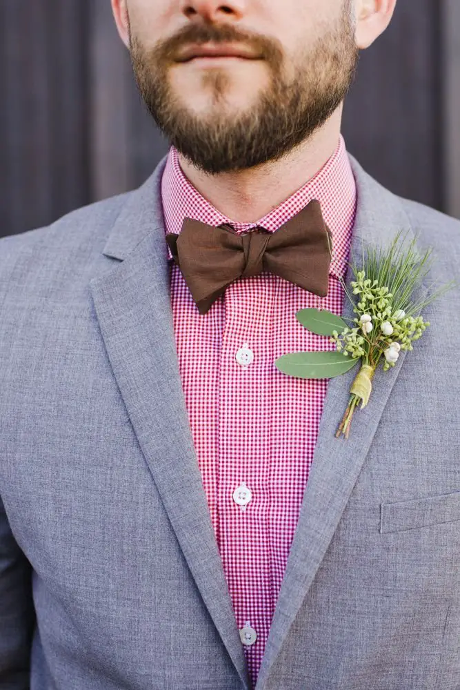 Groomsmen's boutonnieres add a stylish touch to the wedding party attire.