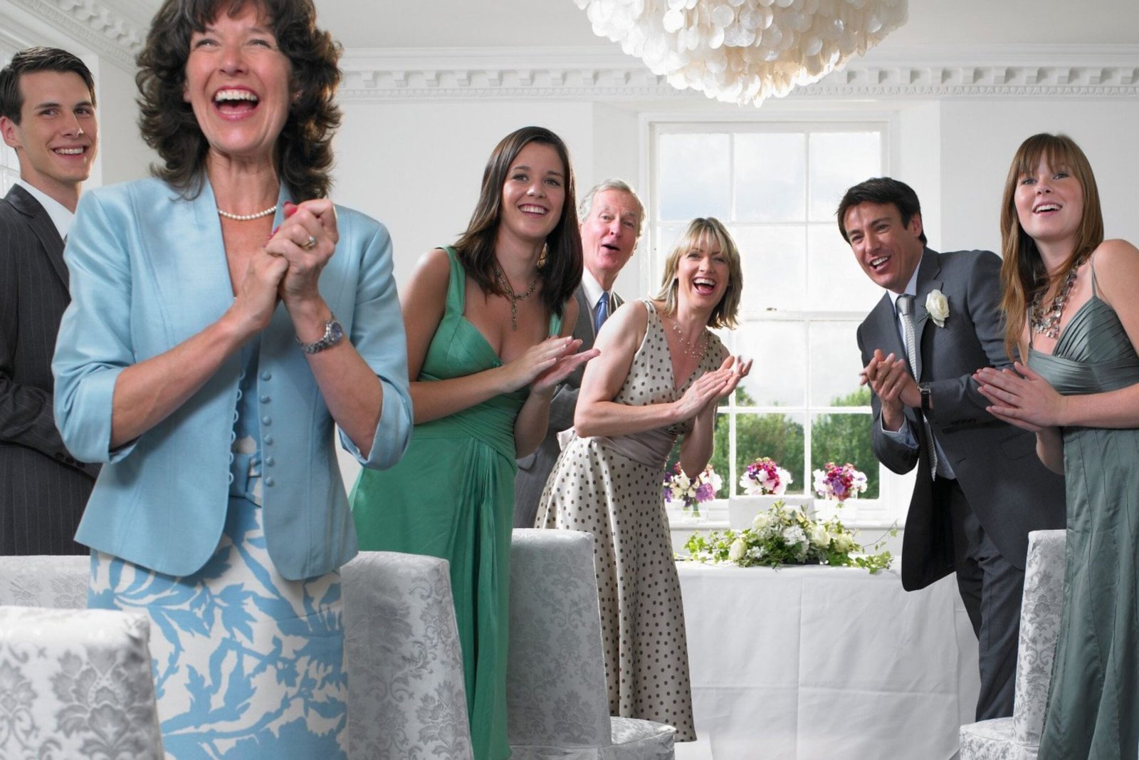 Wedding party at the altar during an interview, capturing a joyful moment.