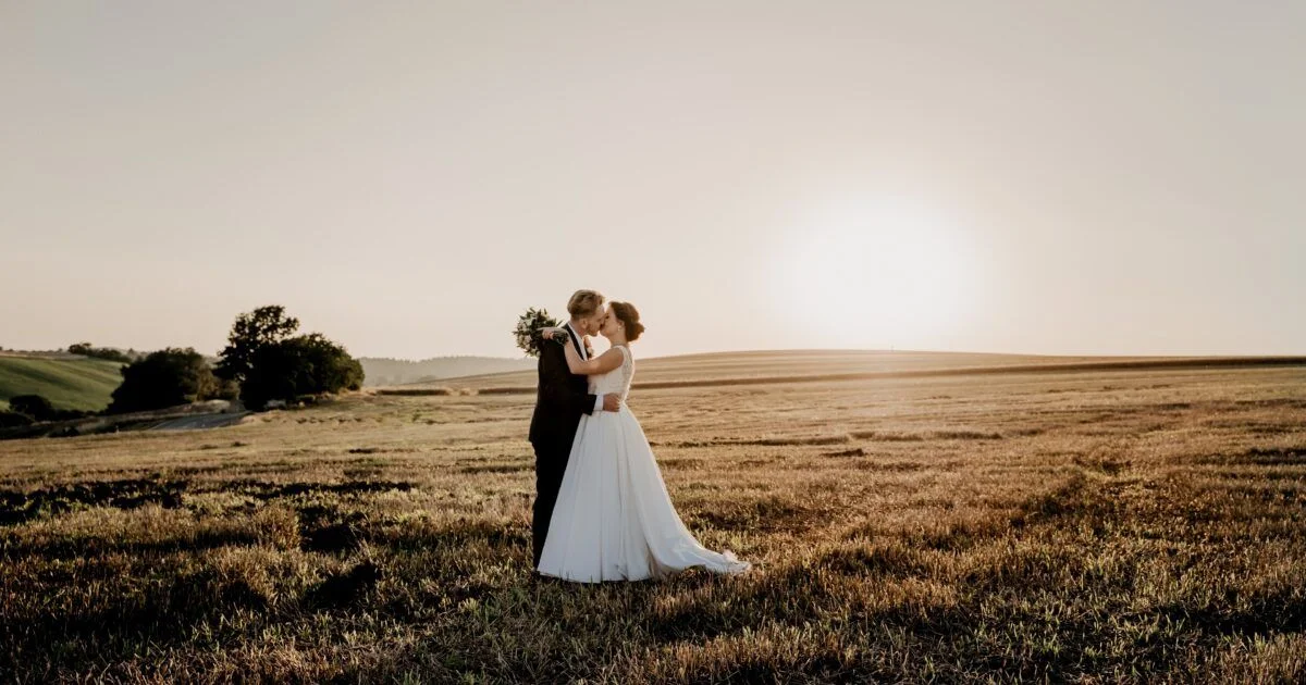 A wedding photographer in Cape Town prepares for a videography session, capturing the essence of love and celebration.