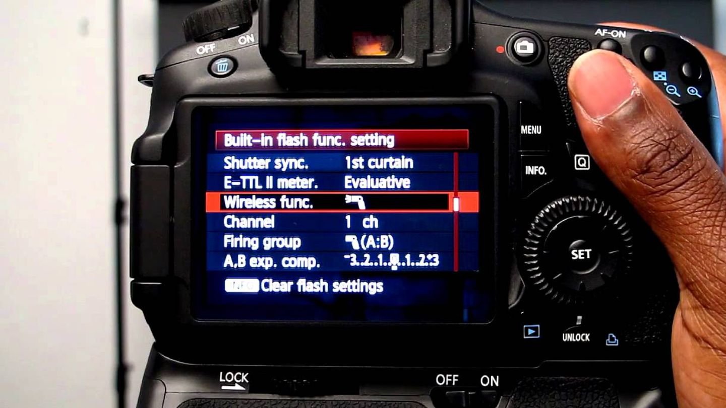 A person holds a digital camera, showcasing the exposure settings on the display screen, emphasizing photography techniques.